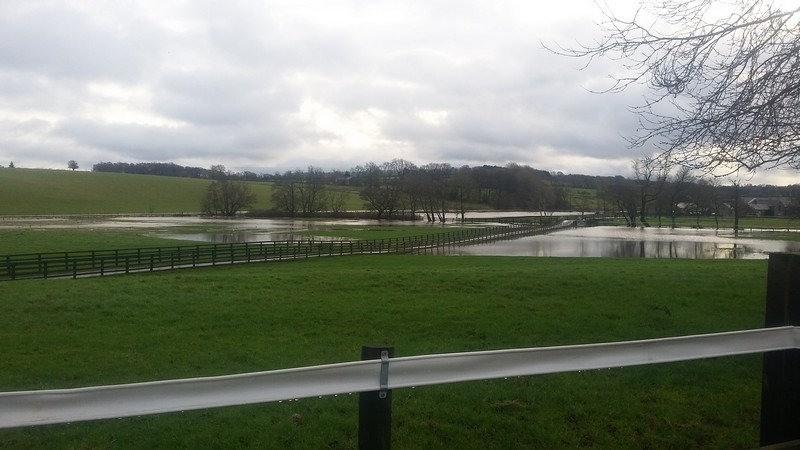 Fields behind the church, and road to stables after Storm Desmond