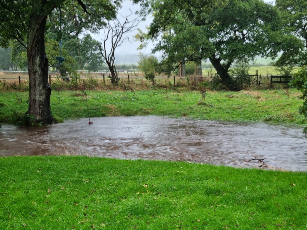 Petteril overflowing on the path to the stables. 7th Oct 2022.