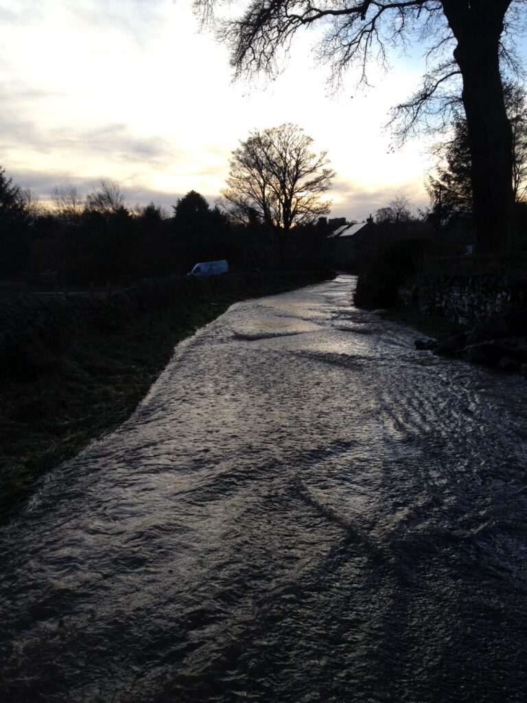 Flooding after Storm Desmond 2015 on the Blencow road just past Quirky Workshops